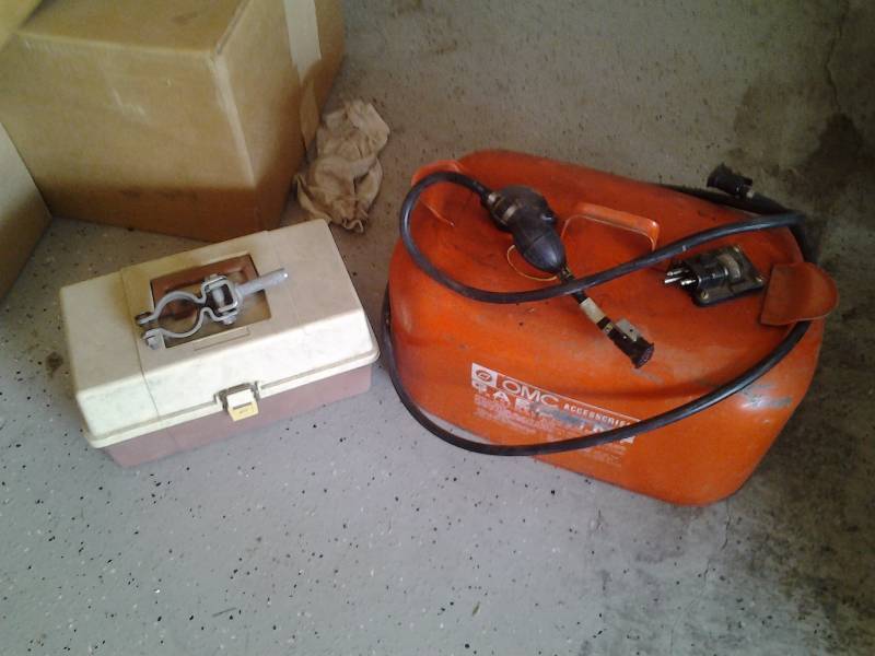 lot 54 image: OMC Gas Can, Hose, Oar Lock, Small Tackle Box