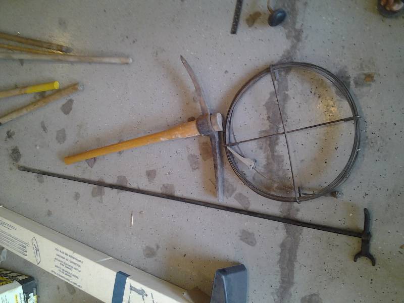 lot 57 image: Pick Ax, Drain Snake, Water Main Shut Off Key
