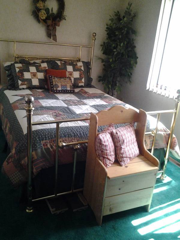 lot 117 image: Brass Bed (Head & Foot Boards Only--Not The Mattress Or Box Spring) Includes Bed Spread & Pillows