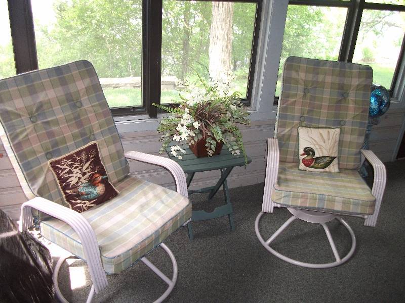 lot 81 image: 3 Swivel Rocker Patio Chairs With Cushions-2 In Photo, 1 Separate Includes Decorative Pillows, Small Plastic Green Table 18x15x20