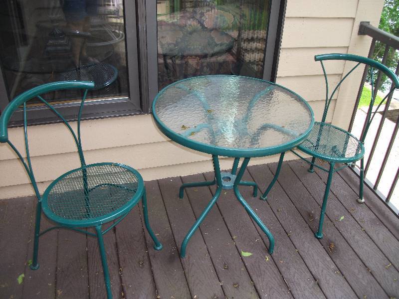 lot 86 image: 3 Piece Green Metal Bistro Set With Glass Top Table Includes Other Green Table With Glass Top 20x20x20