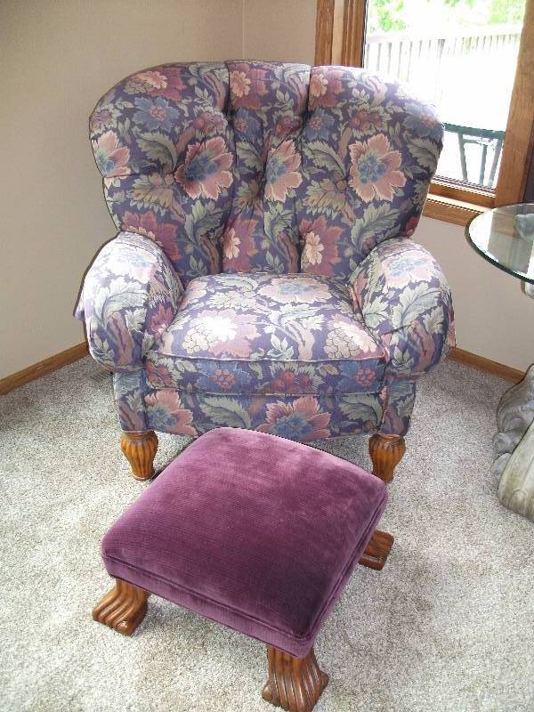 lot 87 image: Over Size Floral Plum Tone Chair With Wood Legs & Foot Stool By Taylor King 42W x 38T