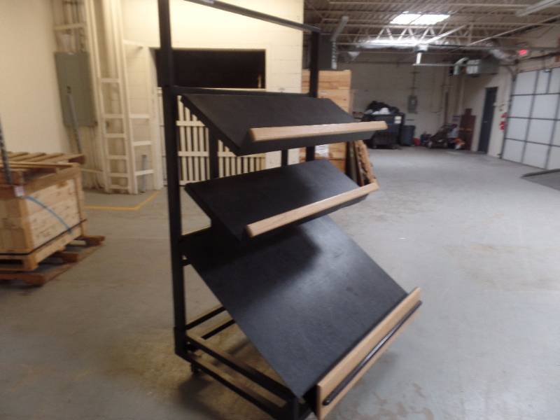 lot 428 image: MODERN ROLLING DISPLAY RACK