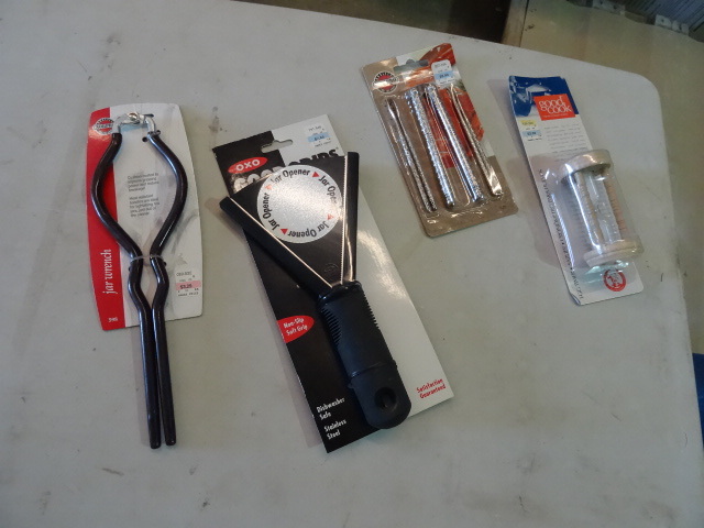 lot 37 image: NEW Lot Kitchen Items Jar Openers, Nut Crackers Hourglass Timer