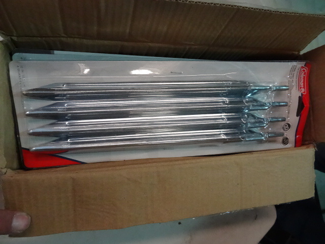 lot 44 image: NEW CASE LOT Coleman Steel tent Stakes, 12 in, 4 Packs of qty 4 stakes ea Total 16 Stakes  Retail $52
