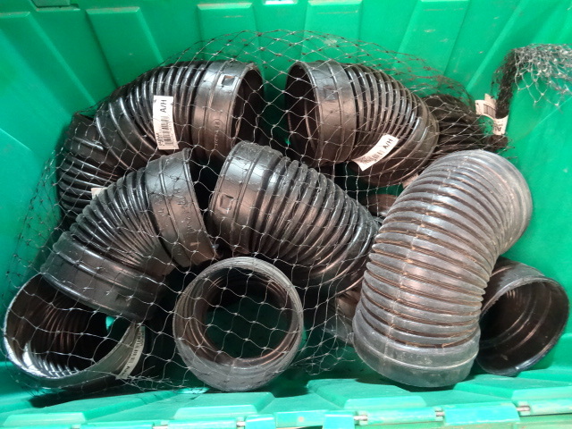 lot 107 image: NEW ENTIRE BIN 4 in Drain Tile Elbows 45 degree approx 10 GREEN BIN NOT INCLUDED