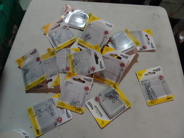 lot 111 image: NEW LARGE LOT Packages of Small Screw Eyes, Various Sizes