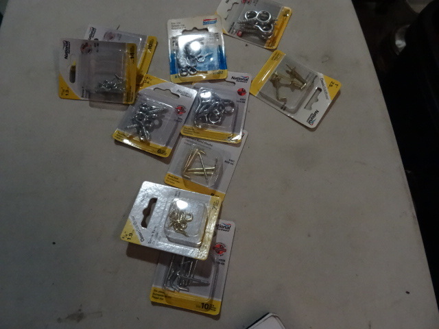 lot 135 image: NEW LOT Various Sizes Screw Eyes and Square Bend Hooks  Retail $25