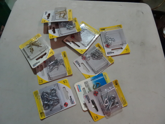 lot 136 image: NEW LOT Various Sizes Screw Eyes and Square Bend Hooks  Retail $25