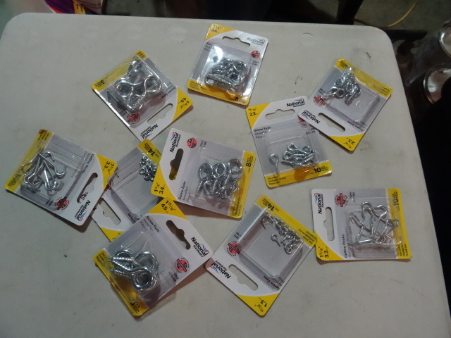 lot 138 image: NEW LOT Various Sizes Screw Eyes and Ceiling Hooks  Retail $25