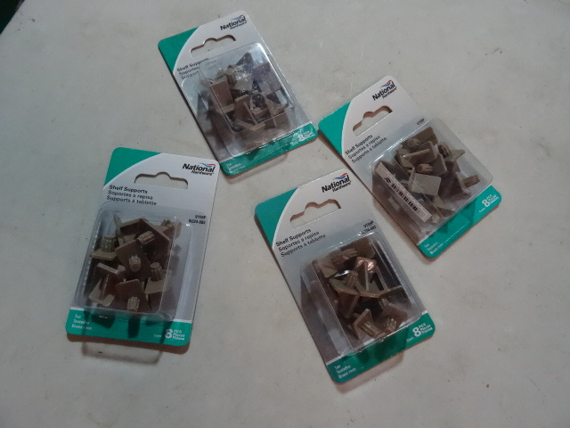 lot 145 image: NEW LOT Qty 4 Packages of Plastic Shelf Supports , 8 pcspack