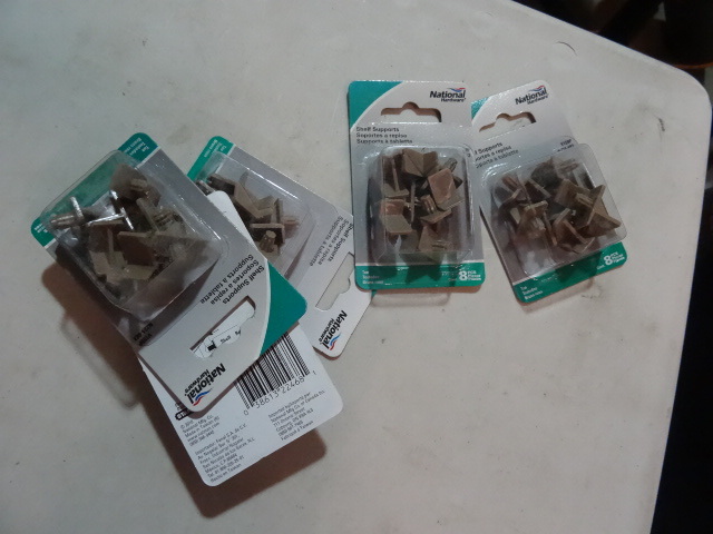 lot 148 image: NEW LOT Qty 4 Packages of Plastic Shelf Supports , 8 pcspack