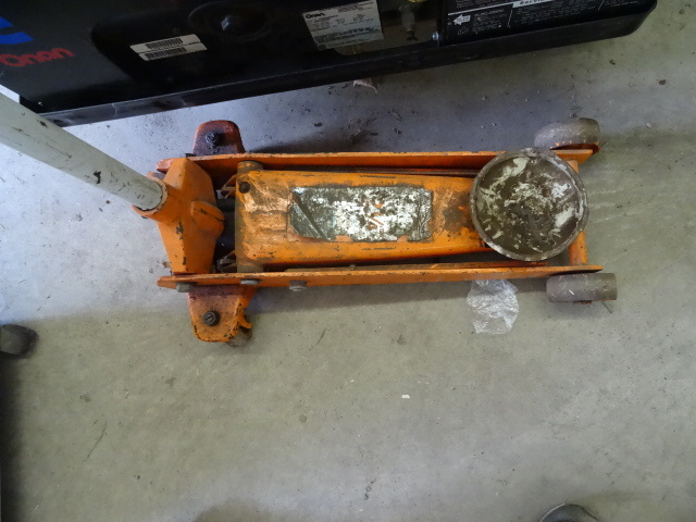 lot 100 image: 2 14 Ton Rolling Floor Jack. Works