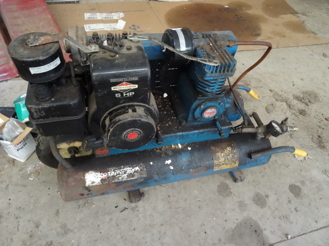 lot 136 image: Spot Nails Inc. Portable Gas Air Compressor