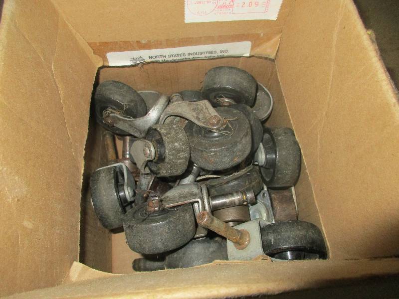 lot 27 image: 23 small wheels and casters