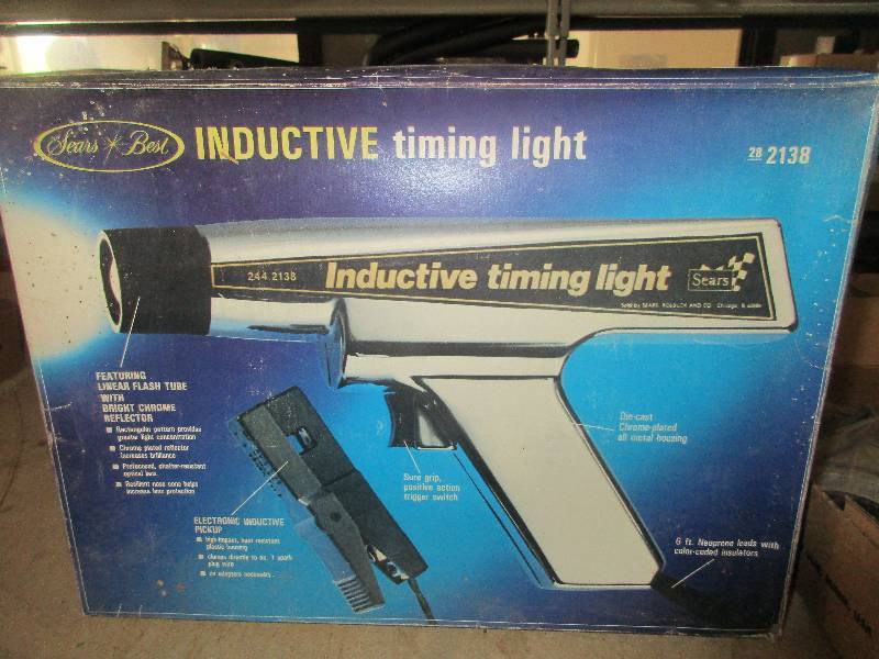 lot 69 image: timing light compression tester and vintage stire display lub-a-spray