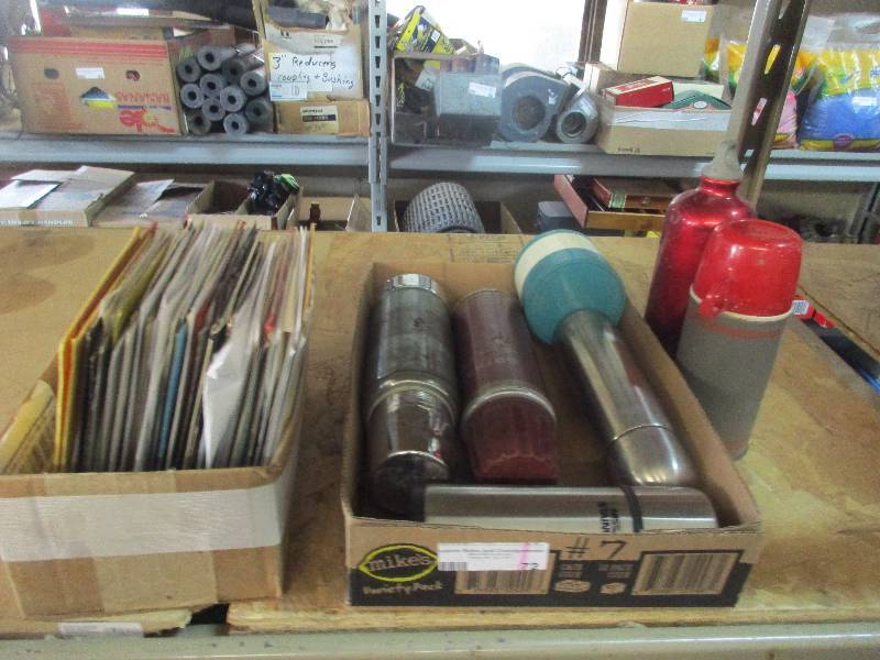 lot 72 image: vintage thermos bottles 6 total and 68 vintage 45s vinyl