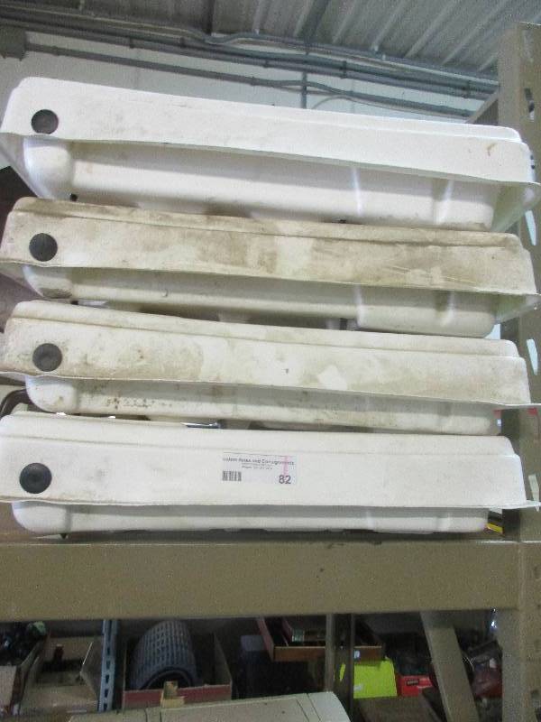 lot 82 image: 4 job site boxes - DeWalt cooler - 3 caulk guns - 2 hard hats - shelf brackets and vent covers