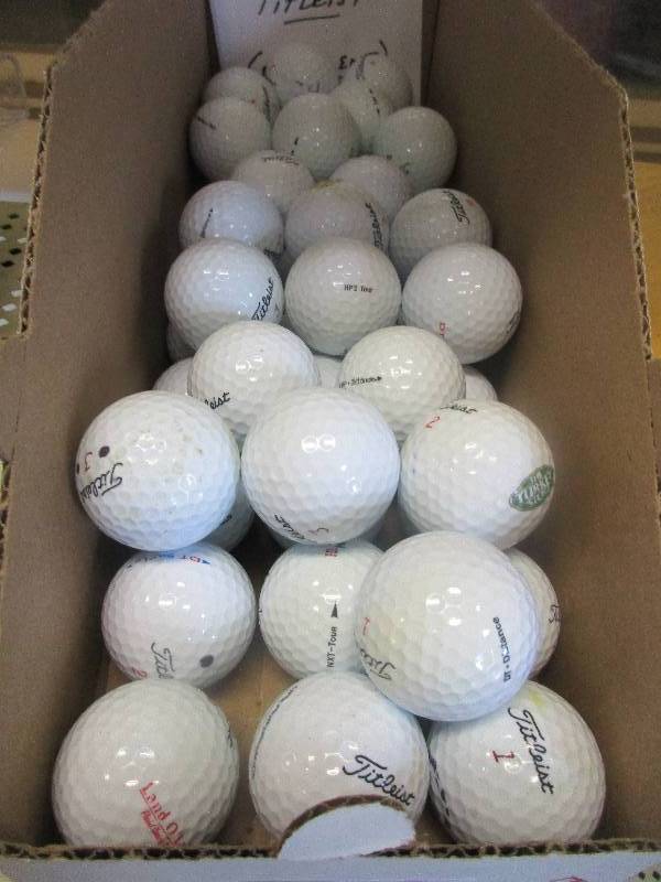 lot 134 image: 4 dozen Titelist golf balls in great shape