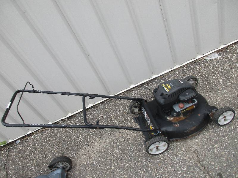 lot 175 image: yard machines 4 HP 21 push mower