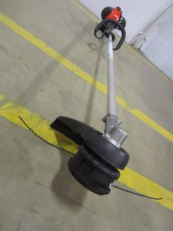 lot 5 image: ECHO 25.4cc professional grade engine string trimmer