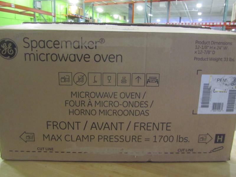 lot 36 image: GE Profile 1.1 cu. ft. Countertop Microwave in White