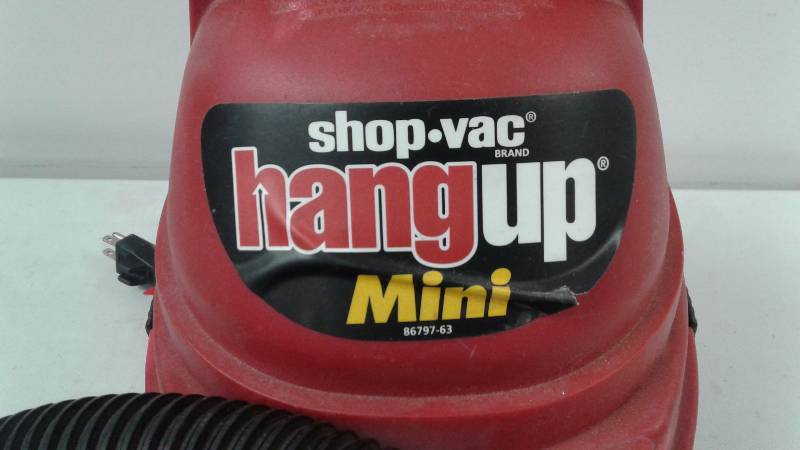 lot 8 image: SHOP VAC HANGUP MINI 86797-63 1 GALLON VACUUM AND PEAK 1 HORSEPOWER