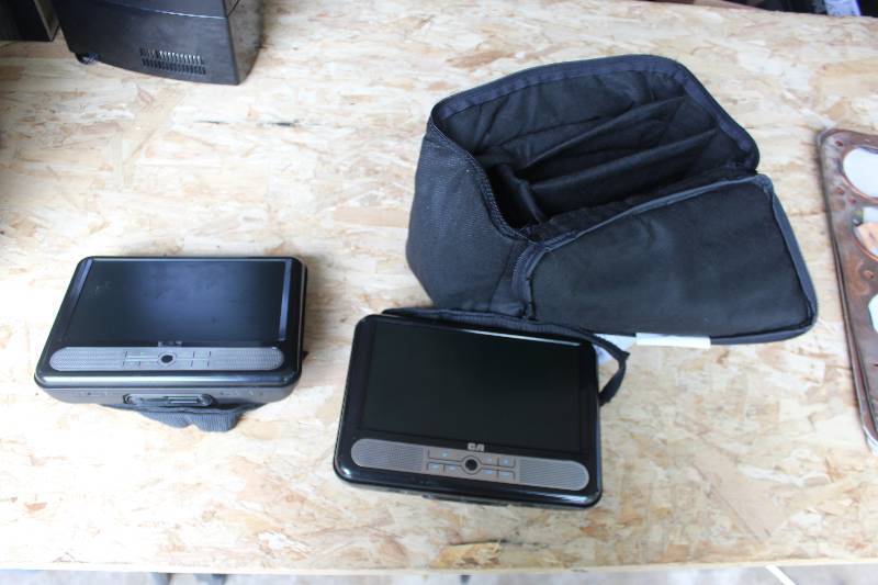 lot 35 image: RCA Twin Mobile DVD Players w 9in. LCD Screen