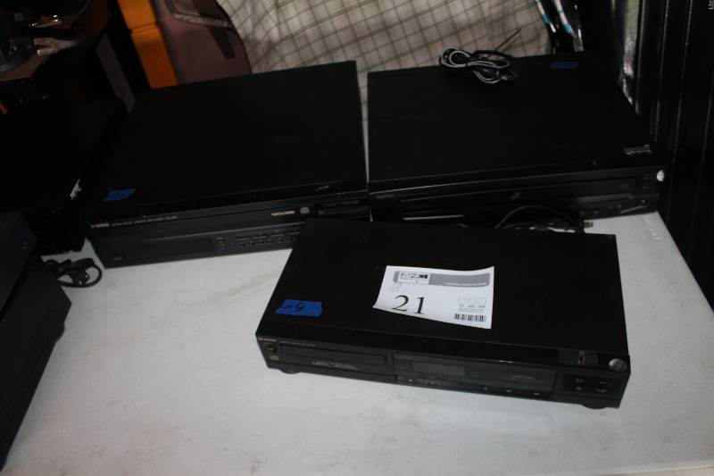 lot 21 image: Lot of (3) Electronics Includes Sharp DX-200 Compact Disc Player, Symphonic CD5800 5-Disc Changer, Yamaha CDC-905 Compact Disc Player