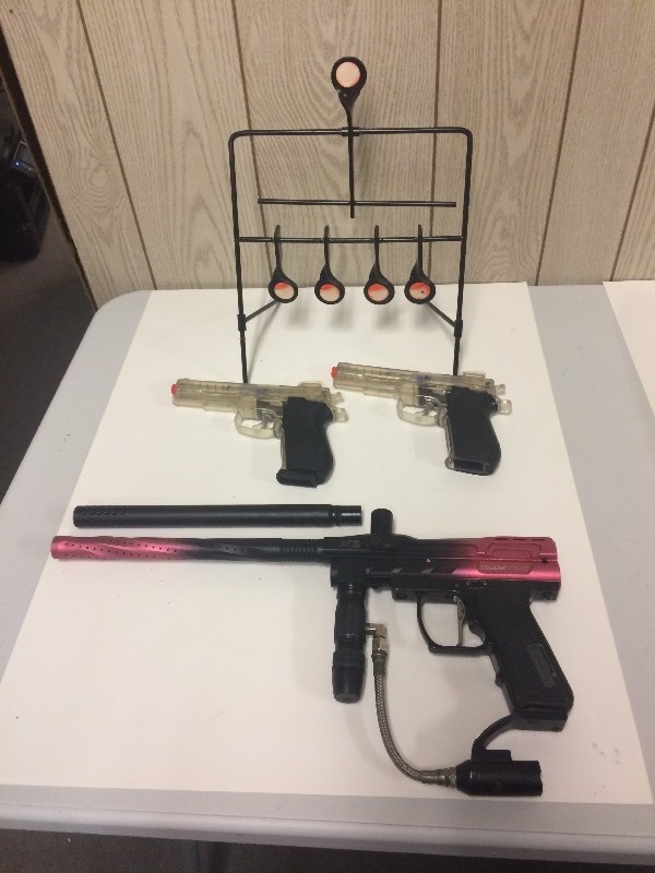 lot 104 image: 2 Smith & Wesson KWC Airsoft Clear Pistol, Spyder ACS Paintball Marker, Target