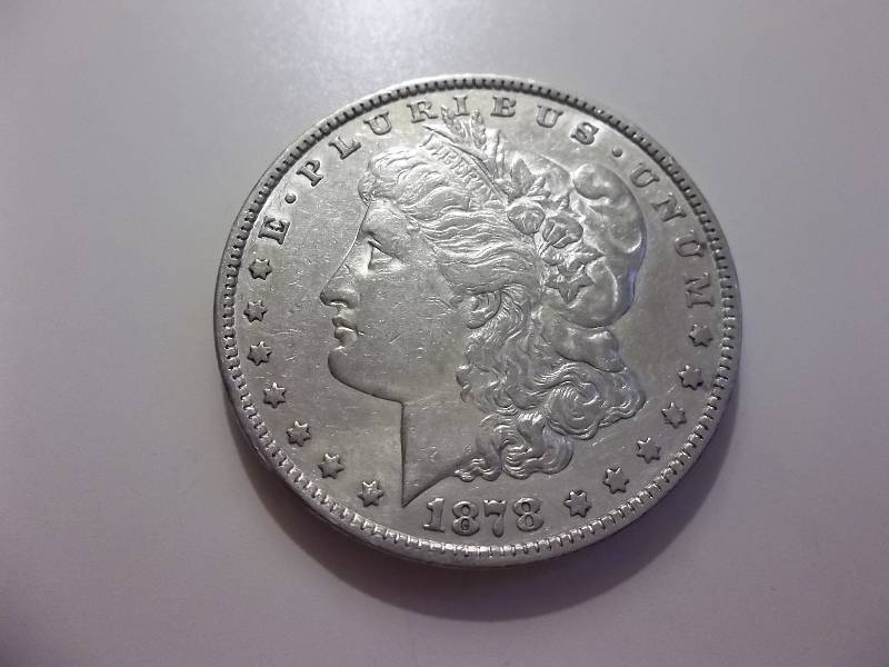 1878  Morgan Silver Dollar High Grade (In AU Valued At $80.00)