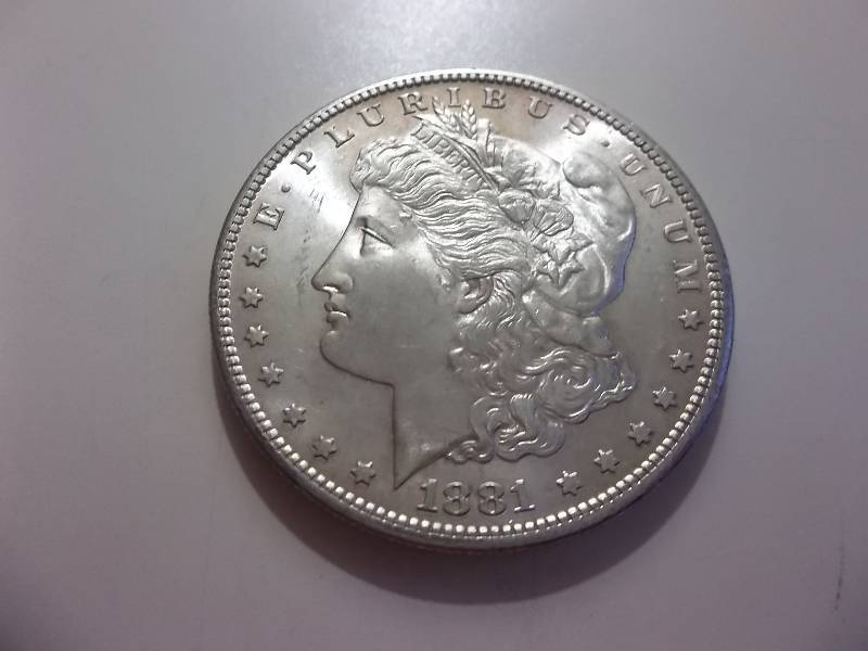 1881 S Morgan Silver Dollar Very High Grade MS (In MS60 $65.00)