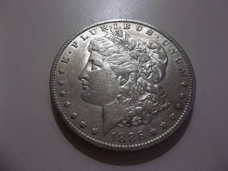 1886 O Morgan Silver Dollar Very High Grade AU
