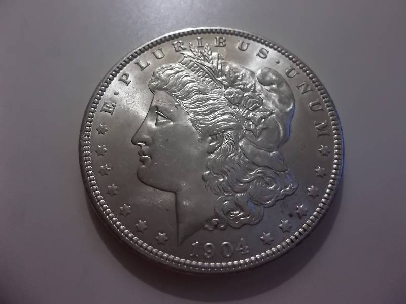 1904  Morgan Silver Dollar Very High Grade MS (In MS63 Valued  $275.00)