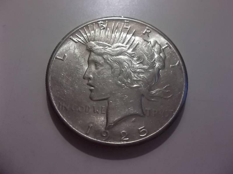 1925  Silver Peace Dollar Very High Grade MS