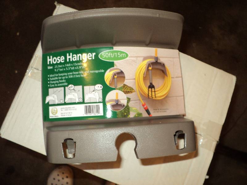 lot 15 image: box of hose hangers, 48 per box...