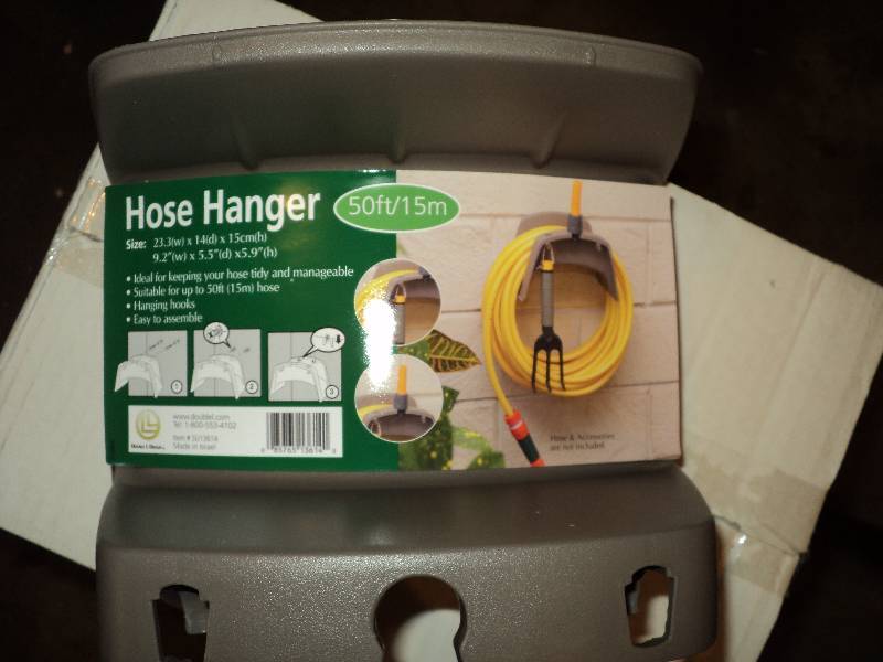 lot 16 image: box of hose hangers, 48 per box...
