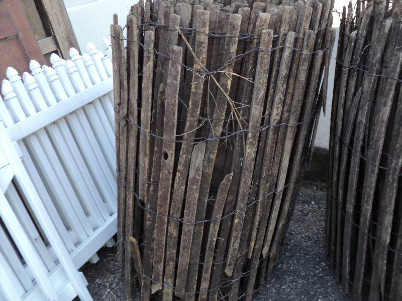 lot 54 image: roll of wood show fencing...
