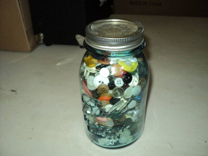 lot 63 image: mason jar full of buttons...