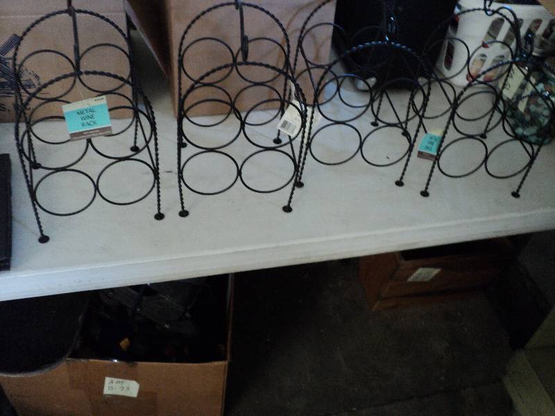 lot 79 image: 4 wine holders (each is retailed at...