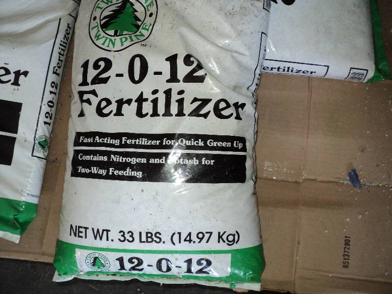 lot 87 image: 1 bag of twin pine fertilizer, 12-0...