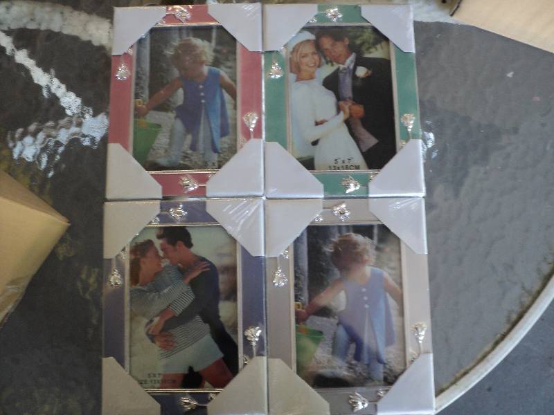 lot 129 image: 12 picture frames 5inx7in...