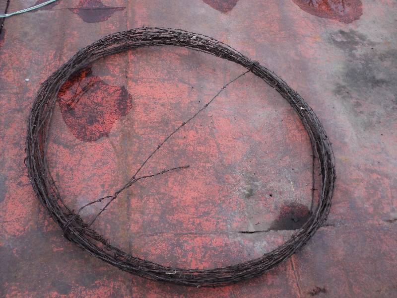 lot 8 image: roll of barbed wire...