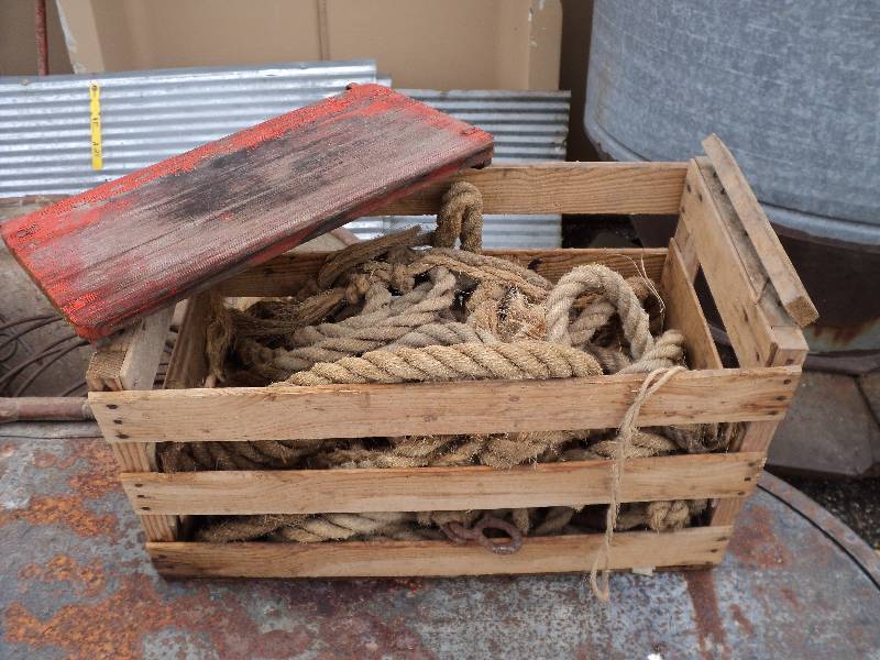 lot 25 image: box full of rope and wood shelf...
