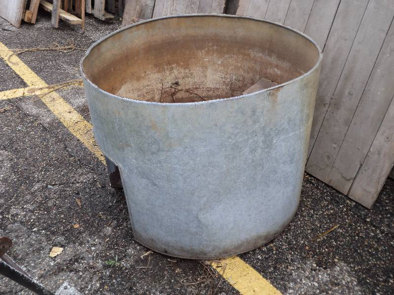lot 48 image: round galvanized piece, 2 ft tall...