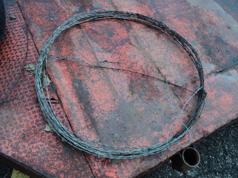 lot 53 image: roll of barbed wire...