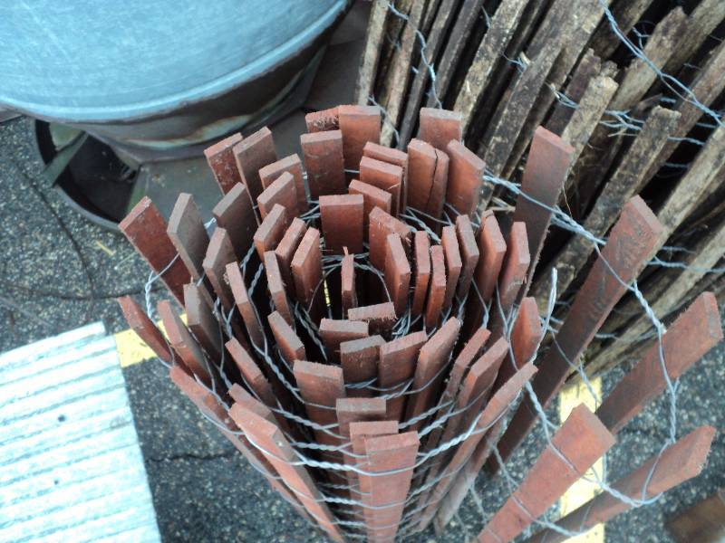 lot 55 image: small roll of wood snow fencing...