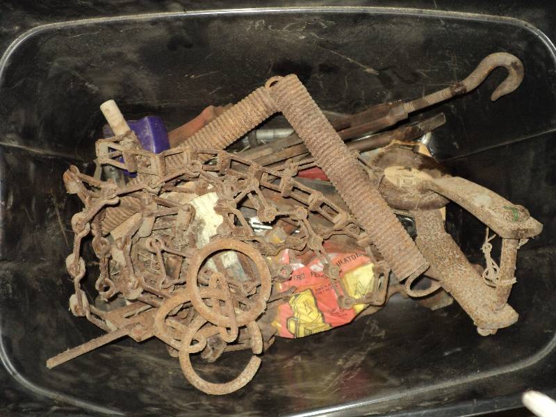 lot 88 image: tote of vintage metal farm pieces...