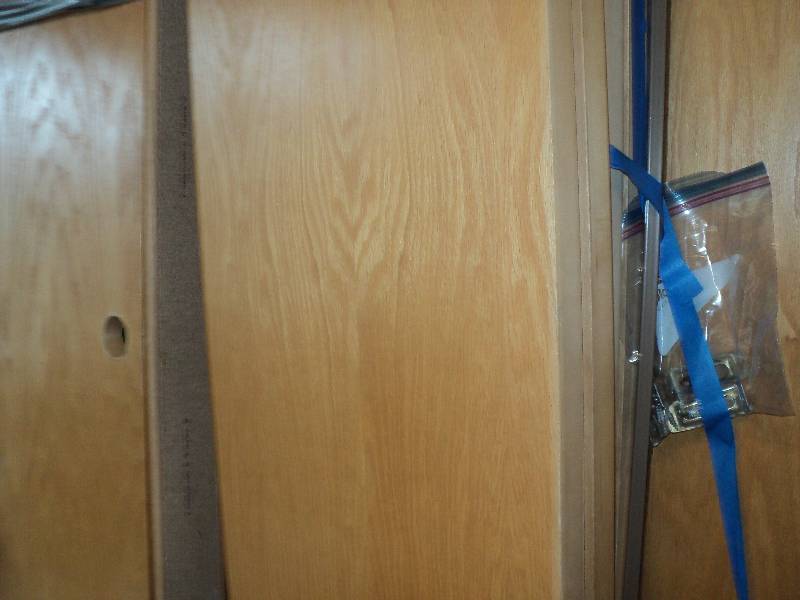 lot 99 image: closet byfold doors, each is 17inx7...