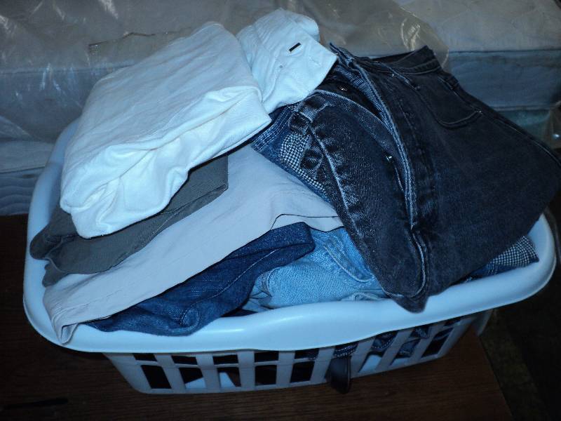 lot 121 image: tote of womens shorts and pants mos...